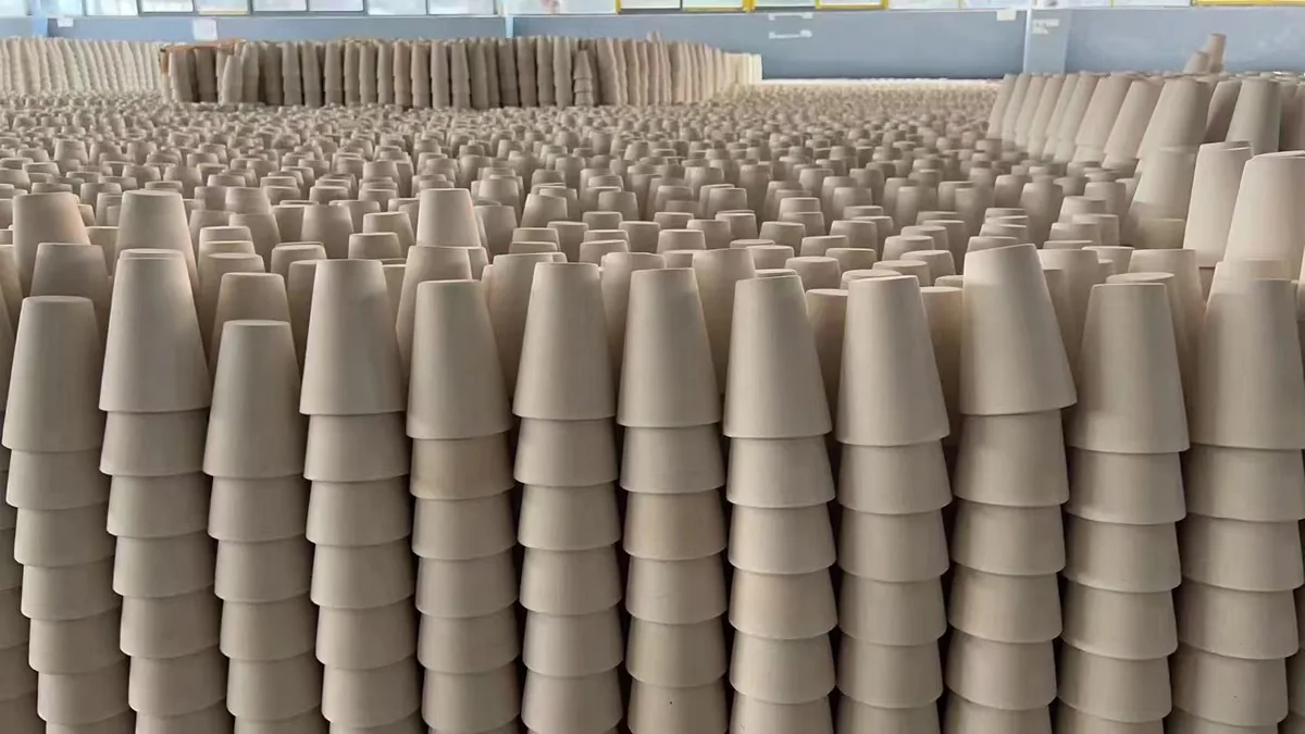 Fire assay crucibles stacked in rows